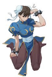  1girl absurdres barefoot black_pantyhose blue_dress bracelet bun_cover capcom chun-li dress full_body hair_bun highres jewelry looking_at_viewer pantyhose puffy_sleeves sash simple_background sitting solo spiked_bracelet spikes street_fighter wariza white_background yiguanli123 
