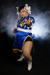  1girl asian black_hair capcom chun-li fat fat_woman female_focus highres photo_(medium) sakuran_watanabe solo street_fighter  rating:Questionable score:2 user:leejunne