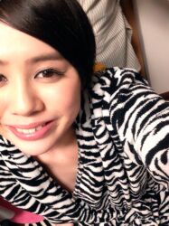 1girl brown_eyes brown_hair female_focus indoors japanese_(nationality) looking_at_viewer medium_hair mole photo_(medium) smile solo teeth yoshikawa_aimi rating:General score:2 user:Alkin