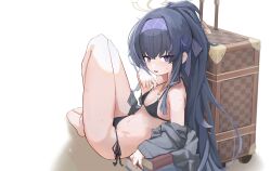  1girl barefoot bikini black_bikini blue_archive blue_eyes breasts cardigan double_strap_slip feet halo highres long_hair mi_kan_(1101515378) navel open_cardigan open_clothes sitting small_breasts solo strap_lift strap_pull strap_slip sweat swimsuit ui_(blue_archive) 