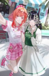  2girls absurdres black_hair blonde_hair blue_eyes blunt_bangs clothes_writing day dhbwinner eyewear_on_head feet_up gradient_hair heart heart-shaped_eyewear highres hololive hololive_dev_is holonatsu_paradise ichijou_ririka ichijou_ririka_(holonatsu_paradise) juufuutei_raden juufuutei_raden_(holonatsu_paradise) long_hair long_skirt looking_at_viewer medium_hair multicolored_hair multiple_girls nail_polish official_alternate_costume official_alternate_hairstyle orange_eyes orange_hair outdoors parted_lips pink_hair pink_nails pink_shirt pink_skirt print_shirt reaching reaching_towards_viewer selfie shirt skirt smile standing teeth two-tone_hair virtual_youtuber 