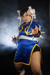  1girl asian black_hair capcom chun-li fat fat_woman female_focus highres photo_(medium) sakuran_watanabe solo street_fighter  rating:Questionable score:2 user:leejunne