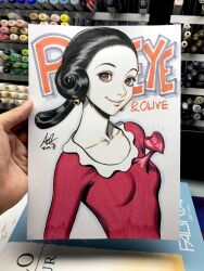  1girl 2018 black_hair dress earrings heart highres jewelry olive_oyl_(popeye) photo_(medium) popeye_the_sailor red_dress smile solo stanley_lau 