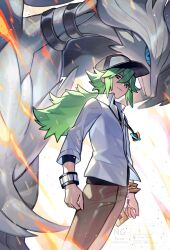  1boy baseball_cap black_hat brown_pants cowboy_shot creatures_(company) dragon fire game_freak gen_5_pokemon green_hair hat highres jewelry legendary_pokemon long_hair male_focus n_(pokemon) nintendo pants pendant pokemon pokemon_bw reshiram shirt solo_focus tsugutoku white_fur white_shirt 