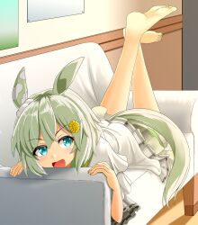  1girl animal_ears barefoot blue_eyes commentary_request couch ear_covers feet feet_up grey_hair hair_between_eyes hair_ornament hairclip highres honda_takaharu horse_ears horse_girl horse_tail indoors legs_up long_sleeves lying on_couch on_stomach open_mouth seiun_sky_(umamusume) shirt short_hair shorts single_ear_cover smile soles solo tail the_pose toes umamusume white_shirt wooden_floor 
