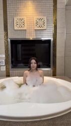 1girl animated asian bath bathing bathroom bathtub black_hair convenient_censoring indoors long_hair looking_at_viewer nude parted_lips real_life saotome_kana smile soap_bubbles soap_censor solo sound standing tagme teeth video