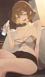 1girl anis_(nikke) arm_support bare_arms black_shorts blush bottle breasts brown_eyes brown_hair cleavage commentary_request couch crop_top goddess_of_victory:_nikke highres holding holding_bottle indoors kji_(rozo) large_breasts looking_at_viewer midriff navel on_couch one_eye_closed open_mouth pinky_out ramune short_hair short_shorts shorts sitting smile solo strapless thighs tube_top white_tube_top