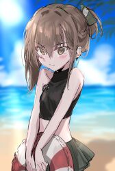 1girl alternate_costume alternate_hairstyle aogisa beach blush brown_eyes brown_hair closed_mouth cloud commentary_request crop_top day hair_between_eyes highres holding holding_swim_ring innertube kantai_collection looking_at_viewer ocean outdoors ponytail short_ponytail skirt sky sleeveless solo swim_ring taihou_(kancolle) water