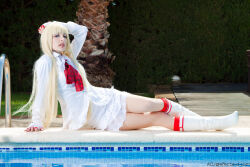 Rule 34 | 1girl, blonde hair, blue eyes, boots, cosplay, emilie de rochefort, emilie de rochefort (cosplay), fingerless gloves, gloves, ivychann, long hair, long sleeves, looking at viewer, lying, photo (medium), pool, poolside, real life, skirt, spanish (nationality), tekken