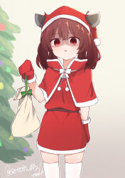 1girl bag brown_hair capelet christmas_tree highres medium_hair mittens red_eyes santa_costume sechin shaded_face solo thighhighs touhoku_kiritan twintails voiceroid white_thighhighs
