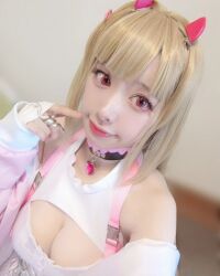 Rule 34 | blonde hair, breasts, cleavage, cosplay, fake horns, goddess of victory: nikke, highres, horns, jewelry, medium breasts, moyoko otsuki, necklace, photo (medium), red eyes, ring, viper (nikke), viper (nikke) (cosplay)