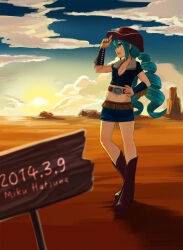 1girl blue_hair boots breasts brown_boots brown_hat character_name cleavage clothes_writing cloud cowboy_boots cowboy_hat dated desert hair_between_eyes hand_on_own_hip hat hatsune_miku highres long_hair low_twintails medium_breasts midriff miniskirt open_mouth outdoors short_sleeves sign skirt sky solo standing sunrise twintails vocaloid yue_(tada_no_saboten)