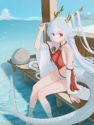 1girl absurdres azur_lane bare_legs bare_shoulders beach breasts commentary detached_sleeves dragon_girl dragon_horns dragon_tail fundoshi hair_on_horn hand_up highres holding holding_own_hair horns japanese_clothes large_breasts legs long_hair looking_at_viewer navel official_alternate_costume red_eyes red_fundoshi shimanto_(azur_lane) shimanto_(the_relaxing_dragon_god)_(azur_lane) sitting soaking_feet solo stomach tail thighs very_long_hair water white_hair yi_ming_lan_qu