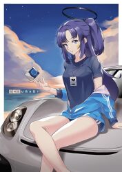 1girl black_shirt black_shorts blue_archive blue_eyes blue_jacket breasts car cloud commentary crossed_legs english_commentary hair_behind_ear halo highres id_card indonesian_commentary jacket looking_at_viewer mechanical_halo medium_breasts mixed-language_commentary motor_vehicle ocean off_shoulder on_car open_hand porsche porsche_cayman shirt short_shorts shorts sitting sky smile sneusagi solo track_jacket two_side_up water yuuka_(blue_archive) yuuka_(track)_(blue_archive)