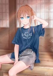 1girl absurdres blue_eyes blue_shirt blush closed_mouth collarbone grey_shorts hair_between_eyes highres kutatsu_(kutatsu7) long_hair looking_at_viewer orange_hair original ponytail shirt short_sleeves shorts sitting smile solo