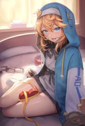 1boy absurdres androgyne_symbol bed blonde_hair box bridget_(guilty_gear) chain commentary_request gift gift_box guilty_gear guilty_gear_strive hair_between_eyes hakusyokuto heart-shaped_box highres indoors long_hair long_sleeves looking_at_viewer male_focus nun on_bed short_hair sitting smile thighs tissue_box trap valentine yo-yo