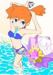 1girl adapted_costume asymmetrical_hair bare_legs beach bikini blue_bikini blue_eyes breasts cowboy_shot denim denim_shorts eyelashes gen_1_pokemon gym_leader hair_tie highres legs misty_(pokemon) navel nintendo orange_hair pokemon pokemon_lgpe pokemon_rgby ponytail red_hair shirt short_hair shorts side_ponytail solo starmie swimsuit thighs water