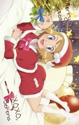 1girl :d ass balloon bed bed_sheet blue_bow blue_bowtie blue_eyes blue_ribbon blush bow bowtie breasts brown_hair candy candy_cane capelet character_name christmas christmas_lights christmas_ornaments christmas_present christmas_tree dress english_text feet_up fingernails food full_body gazing_eye gift hat highres holding holding_mistletoe knee_socks kneehighs long_sleeves looking_at_viewer lying medium_hair mistletoe nintendo on_stomach open_mouth pillow pink_bow pink_bowtie poke_ball poke_ball_(basic) poke_ball_print poke_ball_symbol pokemon pokemon_(anime) pokemon_xy_(anime) presenting red_capelet ribbon santa_costume santa_dress santa_hat serena_(pokemon) sidelocks small_breasts smile snow snowing socks soles sparkle swept_bangs tongue white_socks window