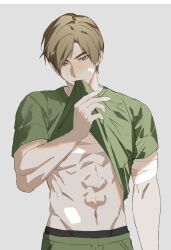 Rule 34 | 1boy, abs, arm up, bandage on face, bandaged arm, bandaged chest, bandages, blonde hair, blue eyes, clothes in mouth, clothes pull, commentary, cowboy shot, green pants, green shirt, groin, highres, jujeop, leon s. kennedy, looking ahead, male focus, male underwear, male underwear peek, mouth hold, muscular, muscular male, navel, pants, parted hair, resident evil, resident evil 2, resident evil 2 (remake), shirt, shirt in mouth, shirt pull, short sleeves, simple background, solo, underwear