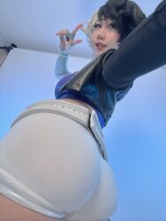 1girl 2025 _gloves asian ass asymmetrical_gloves belt black_hair black_jacket blue_eyes blue_nails border breasts choker cleavage collarbone cosplay cosplay_photo crop_top cropped_jacket danisaurz earrings female_focus fingerless_gloves foreshortening from_behind from_below full_body gloves grin hair_between_eyes hashtag-only_commentary heterochromia highres huge_ass indoors jacket jewelry large_breasts looking_at_viewer looking_back luna_snow luna_snow_(cosplay) marvel marvel_rivals midriff mismatched_gloves multicolored_hair multiple_rings navel open_clothes open_jacket outstretched_arm parted_hair partially_fingerless_gloves photo_(medium) purple_eyes real_life red_lips ring short_hair short_shorts shorts sideboob sidelocks skindentation smile solo split-color_hair thick_lips two-tone_hair v wedge_heels white_belt white_border white_choker white_gloves white_hair white_shorts