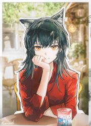 1girl animal_ear_fluff animal_ears arknights black_hair blurry blurry_background expressionless hair_between_eyes head_on_hand heart highres long_hair looking_at_viewer multicolored_hair orange_eyes photo_(object) red_shirt runamonet shirt signature sitting streaked_hair texas_(arknights) wolf_ears wolf_girl
