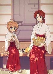 2girls absurdres basket brown_eyes brown_hair cardcaptor_sakura green_eyes hakama highres japanese_clothes kinomoto_sakura long_hair low_ponytail miko mizuki_kaho multiple_girls nzeneee ponytail red_hakama sandals short_hair sitting sliding_doors tatami veranda