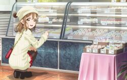 1girl artbook bag beanie black_pantyhose blush brown_hair cake food handbag hat highres kunikida_hanamaru long_hair looking_at_viewer looking_back love_live! love_live!_sunshine!! non-web_source official_art open_mouth pantyhose red_skirt ribbed_sweater shop skirt smile solo squatting sweater yellow_eyes