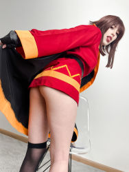 Rule 34 | 1girl, absurdres, ass, asymmetrical legwear, black cape, black gloves, black hat, black socks, blunt bangs, brown hair, cape, carpet, chair, cosplay, cosplay photo, dress, eyeliner, feet out of frame, fingerless gloves, fingernails, from behind, from below, gloves, hat, highres, kneehighs, kneepits, kono subarashii sekai ni shukufuku wo!, lips, long sleeves, looking at viewer, looking down, makeup, medium hair, megumin, megumin (cosplay), mismatched legwear, photo (medium), red dress, red eyes, sidelocks, single kneehigh, single sock, sitting, socks, solo, standing, stelarhoshi, teeth, tongue, tongue out, unworn hat, unworn headwear, upper teeth only, wall, witch hat