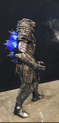 Rule 34 | 1boy, adapted costume, armor, batzemo, blue eyes, cosplay, cosplay photo, glowing, glowing eyes, glowing spikes, godzilla, godzilla: king of the monsters, godzilla (cosplay), godzilla (monsterverse) (cosplay), godzilla (series), kaiju, legendary pictures, monsterverse, no pupils, personification, photo (medium), real life, salvador hernandez, spikes, toho