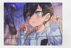 1boy aged_down aqua_eyes black_hair blue_lock blue_shirt border child grey_border hair_between_eyes itoshi_rin long_sleeves male_focus negairi net open_mouth shirt short_hair upper_body