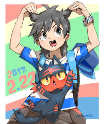1boy antenna_hair backpack bag baseball_cap cat_day chestnut_mouth creatures_(company) dated elio_(pokemon) game_freak gen_7_pokemon grey_eyes grey_hair hair_ears hands_up hat litten makoto_ikemu medium_hair nintendo open_mouth pants pokemon pokemon_(creature) pokemon_sm shirt short_sleeves signature striped_clothes striped_shirt unworn_hat unworn_headwear v-shaped_eyebrows z-ring