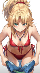 1girl bare_shoulders bikini blonde_hair blush braid breasts clothes_pull collarbone fate/apocrypha fate_(series) front-tie_bikini_top front-tie_top green_eyes hair_ornament hair_scrunchie half_up_braid highres jewelry long_hair looking_down medium_breasts mordred_(fate) necklace pants pants_pull ponytail red_bikini red_scrunchie revision scrunchie side-tie_bikini_bottom sidelocks solo swimsuit tonee
