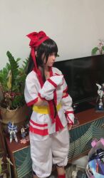 1girl ainu_clothes black_hair blue_eyes breasts doll fingerless_gloves gloves hair_ribbon highres legs long_hair nakoruru pants ribbon samurai_spirits sex_doll small_breasts snk solo the_king_of_fighters thighs