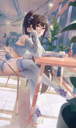 1girl :o absurdres ahoge armpit_crease bare_shoulders belt blue_nails bookshelf brown_eyes brown_hair chain crop_top crossed_legs dragon_hair_ornament elbow_on_table fire_hydrant full_body goddess_of_victory:_nikke highres indoors just_tume leaning_forward looking_at_viewer moran_(nikke) moran_(off-duty_queen)_(nikke) multicolored_hair navel ponytail round_eyewear shirt shoes short_sleeves sign sitting skindentation sneakers solo thighhighs tile_floor tiles white_shirt wicker_furniture window