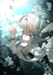 1girl air_bubble bare_shoulders blurry blurry_background blurry_foreground bubble commentary_request depth_of_field dress feathered_wings flower from_side green_eyes grey_dress grey_hair hu_kotora interlocked_fingers long_hair looking_up mini_wings original own_hands_clasped own_hands_together parted_lips profile solo underwater water white_flower white_wings wings