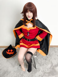 Rule 34 | 1girl, absurdres, asymmetrical legwear, belt, belt collar, black cape, black gloves, black hat, black socks, breasts, brown hair, cape, carpet, chair, collar, cosplay, cosplay photo, dress, eyelashes, feet, fingerless gloves, full body, gloves, hands on own hips, hat, highres, indoors, kneehighs, kono subarashii sekai ni shukufuku wo!, lips, looking at viewer, megumin, megumin (cosplay), mismatched legwear, photo (medium), red dress, red eyes, single kneehigh, single sock, sitting, small breasts, smile, socks, solo, staff, stelarhoshi, toes, transparent, unworn hat, unworn headwear, wall, witch hat