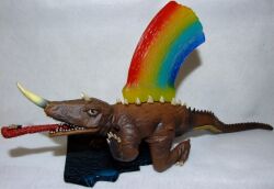 1boy all_fours barugon chameleon daiei_motion_picture energy energy_beam figure gamera_(series) gamera_vs._barugon giant giant_monster horns kaiju laser lizard long_tongue monster multicolored_energy_beam nasal_horn onodera_(gamera) open_mouth rainbow rainbow_death_ray sharp_teeth simple_background spike_beam spikes tail teeth tongue tongue_out toy truth9 very_long_tongue white_background yujin_(toy_company)