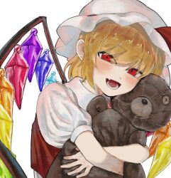 1girl agonaga_ganman blonde_hair crystal crystal_wings fang flandre_scarlet hat highres holding holding_stuffed_toy hugging_object looking_at_viewer mob_cap open_mouth puffy_short_sleeves puffy_sleeves red_eyes shirt short_hair short_sleeves side_ponytail simple_background solo stuffed_animal stuffed_toy teddy_bear touhou white_background white_shirt wings