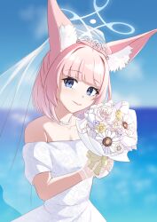 1girl animal_ears blue_archive blue_eyes blue_halo blue_sky blurry blurry_background bouquet breasts closed_mouth collarbone day dress flower fox_ears fox_girl gloves halo highres holding holding_bouquet jewelry medium_hair necklace niko_(blue_archive) ocean outdoors pearl_necklace pink_hair pink_lips rose s-hi-meji see-through_clothes see-through_gloves see-through_veil short_sleeves sky smile solo tiara veil white_dress white_flower white_gloves white_rose