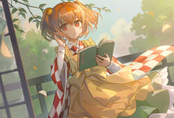 1girl apron bell blue_sky book checkered_clothes checkered_kimono clothes_writing cloud commentary cowboy_shot dutch_angle falling_leaves hair_bell hair_ornament hand_in_own_hair holding holding_book japanese_clothes kimono lazuri7 leaf long_sleeves looking_at_viewer motoori_kosuzu orange_hair red_eyes short_hair sky solo sunlight touhou tree twintails wide_sleeves yellow_apron