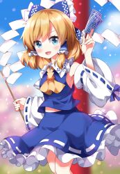 1girl :d alice_margatroid alternate_color ascot bare_shoulders blonde_hair blue_eyes blue_skirt blurry blurry_background blush bow commentary_request cosplay detached_sleeves frilled_bow frilled_skirt frills gohei hair_bow hakurei_reimu hakurei_reimu_(cosplay) happy highres holding_ofuda long_sleeves midriff_peek official_alternate_color open_mouth outdoors player_2 ruu_(tksymkw) shirt skirt sleeveless sleeveless_shirt smile solo torii touhou white_sleeves wide_sleeves yellow_ascot