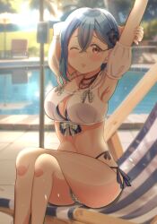 1girl armpits arms_up bandeau bikini black_flower blue_hair breasts chair cleavage cleavage_cutout clothing_cutout commentary_request crossed_bangs crossed_legs flower green_bikini hair_between_eyes hair_flower hair_ornament highres large_breasts light_particles looking_at_viewer lounge_chair love_live! love_live!_days:_love_live!_general_magazine love_live!_superstar!! navel noanekosan off-shoulder_bandeau off_shoulder official_alternate_costume orange_eyes outdoors plaid_bikini plaid_clothes pool poolside short_hair sitting solo stomach stretching swimsuit wakana_shiki white_bandeau