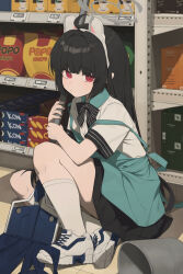 1girl absurdres animal_ears apron black_hair blue_archive blunt_bangs chips_(food) collared_shirt commentary fake_animal_ears food full_body green_apron grey_halo halo highres holding horizontal-striped_bow horizontal-striped_clothes huaaa_nn looking_at_viewer miyu_(blue_archive) red_eyes shirt shoes shop sitting sneakers socks solo white_socks
