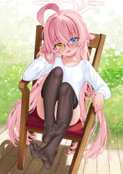 1girl absurdres ahoge alternate_costume black_thighhighs blue_archive chair halo highres hoshino_(blue_archive) huge_ahoge loli long_sleeves looking_at_viewer no_pants no_shoes on_chair pink_hair pink_halo shirt sitting solo thighhighs toes toki913710 white_shirt