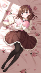 1girl black_pantyhose blue_eyes book bow brown_hair brown_skirt eluthel flower frilled_skirt frilled_sleeves frills hair_bow heart heart-shaped_pillow highres hugging_object idolmaster idolmaster_cinderella_girls layered_skirt long_sleeves lying neck_ribbon on_bed pantyhose pillow pillow_hug pink_flower pink_pillow purple_bow ribbon rose sakuma_mayu shirt short_hair skirt solo white_shirt
