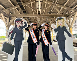 aida_rikako costume hat love_live! love_live!_sunshine!! ohara_mari outdoors photo_(medium) sakurauchi_riko salute smile standing suzuki_aina_(voice_actor) train_conductor train_station voice_actor