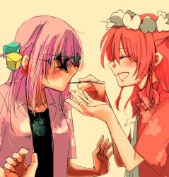 absurdres black_shirt blush bocchi_the_rock! cube_hair_ornament feeding glasses gotoh_hitori hair_ornament head_wreath highres holding_utensil kita_ikuyo long_hair open_clothes pink_hair pink_shirt red_hair red_shirt shirt utensil_in_mouth
