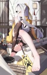 1girl absurdres architecture bare_shoulders black_thighhighs blush boots breasts calligraphy_brush chinese_commentary closed_mouth commentary_request east_asian_architecture feet fingerless_gloves gloves grey_hair hair_ornament highres holding_with_feet indoors jacket large_breasts long_hair paintbrush profile scroll single_off_shoulder single_thighhigh sitting soles solo stirrup_legwear thighhighs toeless_legwear toes torn_clothes torn_thighhighs unworn_boots voi_271 white_boots yellow_eyes yellow_jacket yi_xuan_(zenless_zone_zero) zenless_zone_zero