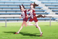 2girls animal_ears bleachers blurry blurry_background breasts brown_hair clenched_teeth commentary_request dated green_eyes grin hand_on_another&#039;s_back high_heels horse_ears horse_girl horse_tail ines_fujin_(umamusume) jacket long_sleeves mejiro_ryan_(umamusume) multicolored_hair multiple_girls open_clothes open_jacket outdoors red_jacket red_shorts running shadow shirt shoes short_hair shorts side_ponytail small_breasts smile sneakers tail takuzui teeth tracen_training_uniform twitter_username two-tone_hair umamusume visor_cap white_shirt