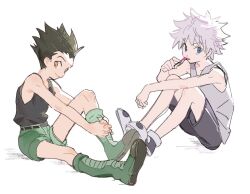 2boys belt black_belt black_hair black_shoes black_shorts black_tank_top blue_eyes boots chinese_commentary closed_mouth commentary_request full_body gon_freecss green_boots green_shorts grey_tank_top hunter_x_hunter killua_zoldyck male_focus multiple_boys orange_eyes putting_on_footwear shoes short_hair shorts simple_background sitting smile spiked_hair tank_top white_background white_hair wobuzaia